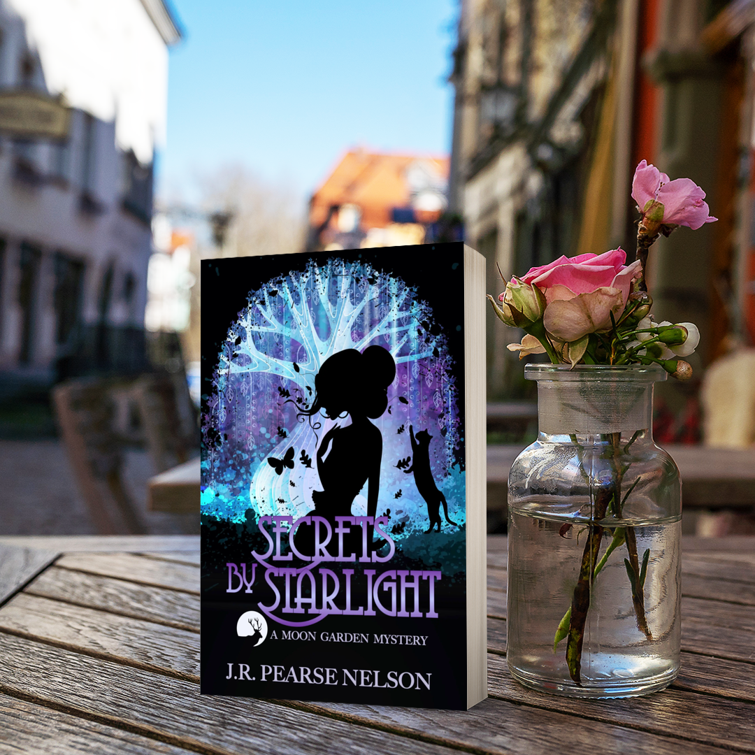 Secrets by Starlight paranormal cozy author J.R. Pearse Nelson